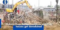 Mukuru Kwa Reuben residents watch as houses get demolished