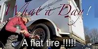 What a Day! I get a flat tire on the horse trailer.