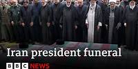 Iran’s supreme leader Ayatollah Khamenei leads prayers at President Raisi's funeral | BBC News