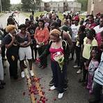 How long was Michael Brown left in the street?2