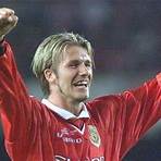 How old was David Beckham when he wore a '90s hairstyle?4