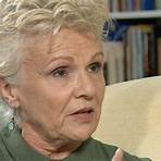 Why was Julie Walters awarded a damehood at Buckingham Palace?1