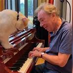 How many songs does Andrew Lloyd Webber have?2