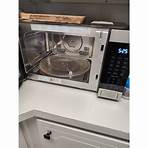how much space does a ge microwave need to use calculator instructions model3
