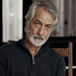 Where did David Russell Strathairn grow up?4