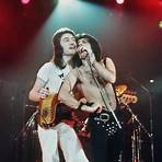 Who is Queen bassist John Deacon?1
