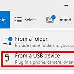 How do I transfer photos from my phone to my PC?1
