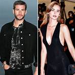 What time does Liam Hemsworth share photos of Gabriella Brooks?1
