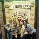 How did Johnny Carson learn axe throwing?4