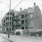 When was the first apartment building in Cincinnati built%3F1