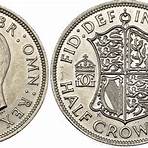 Who engraves King George VI coins?3
