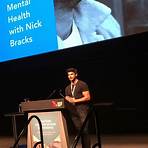 How does Nick Bracks use his life experience to help others?2