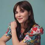 Why did Zooey Deschanel become a producer on 'New Girl'?1