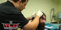 Luke Harper receives medical attention after his match with Dolph Ziggler: TLC 2014