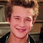 When did Nick Roux start acting?2