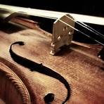 What was the first string instrument to be made?1