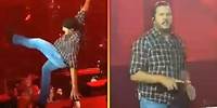 Luke Bryan Falls on Stage After Slipping on a Fan's Phone